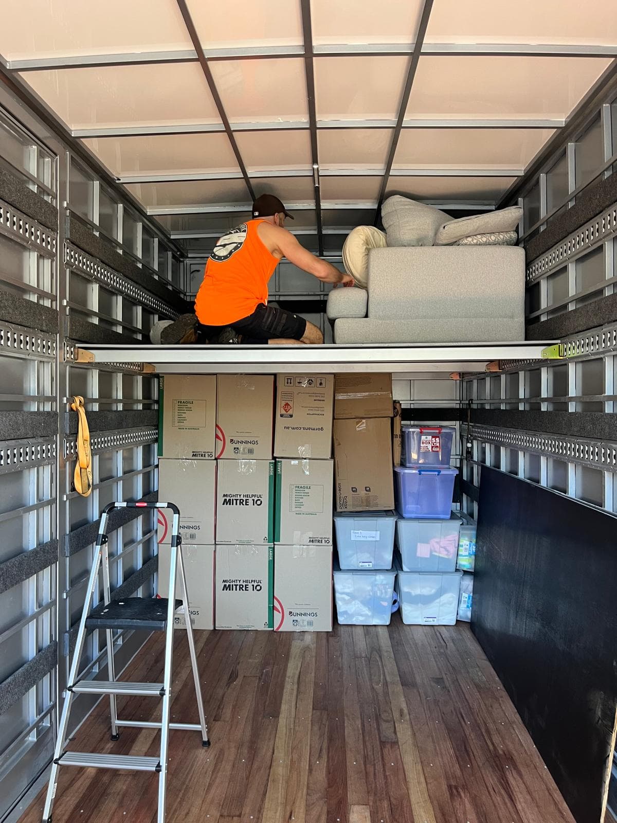 Loading a sofa from a Byron hinterland home