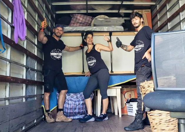 3 removalists inside a truck in mullumbimby